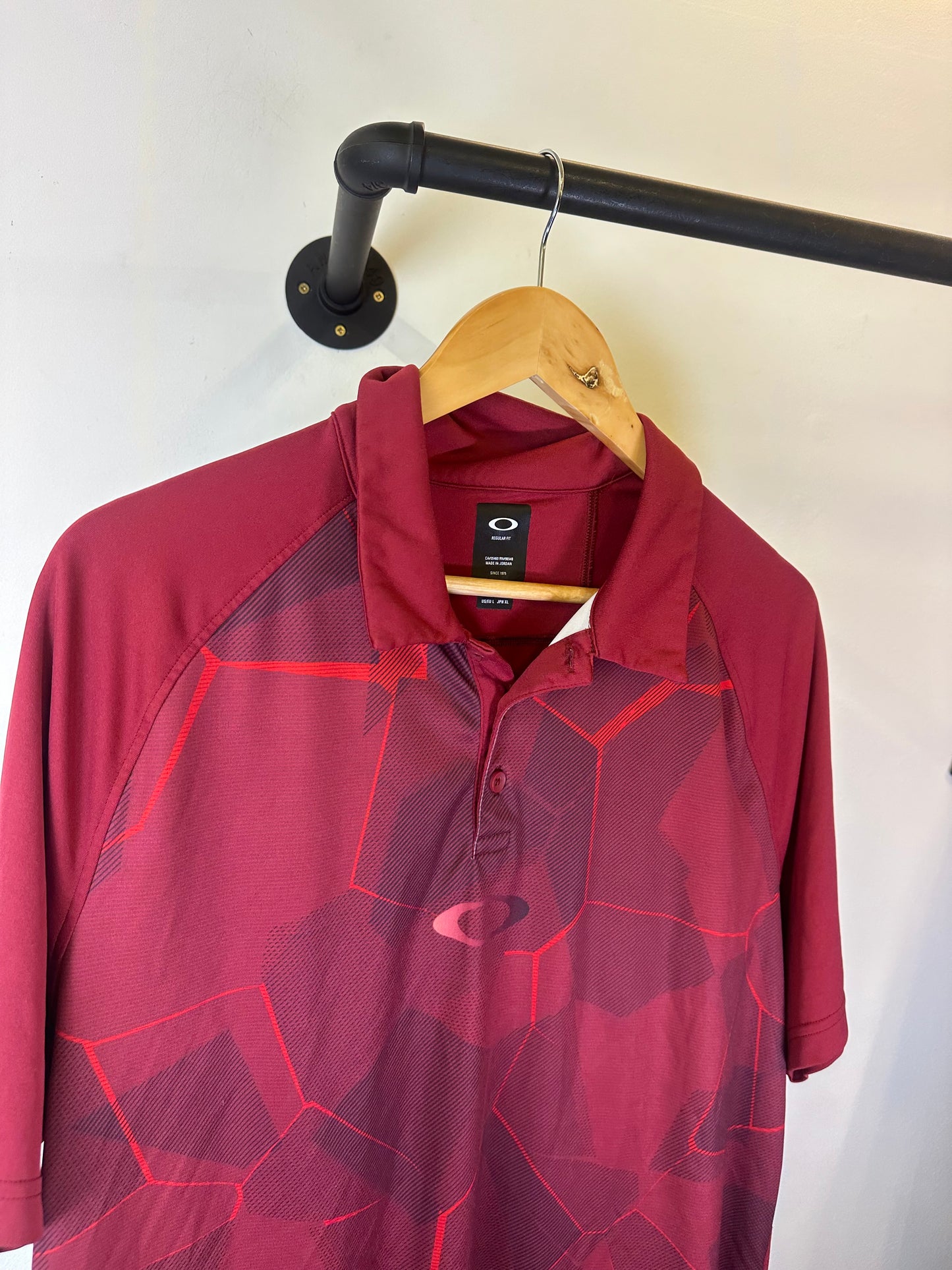 Oakley polo top (L)