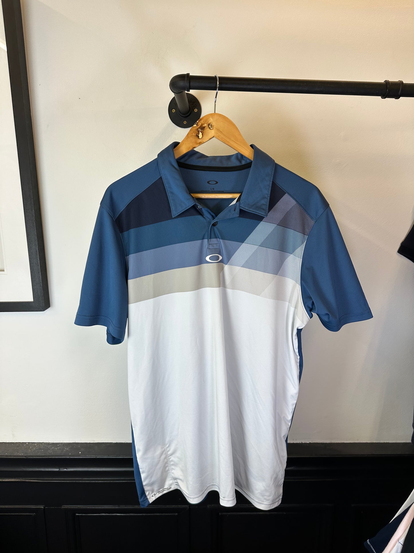 Oakley polo top (L)