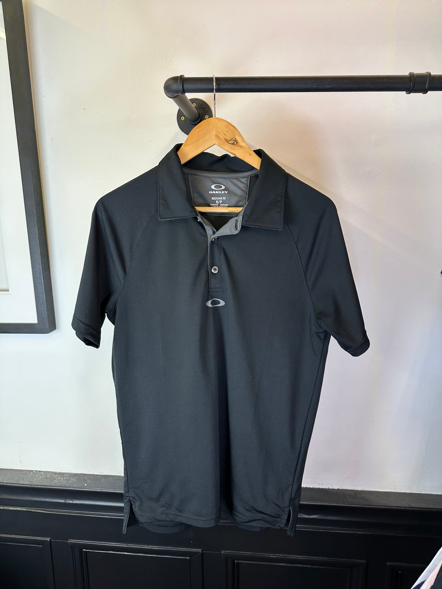 Oakley polo top (S)
