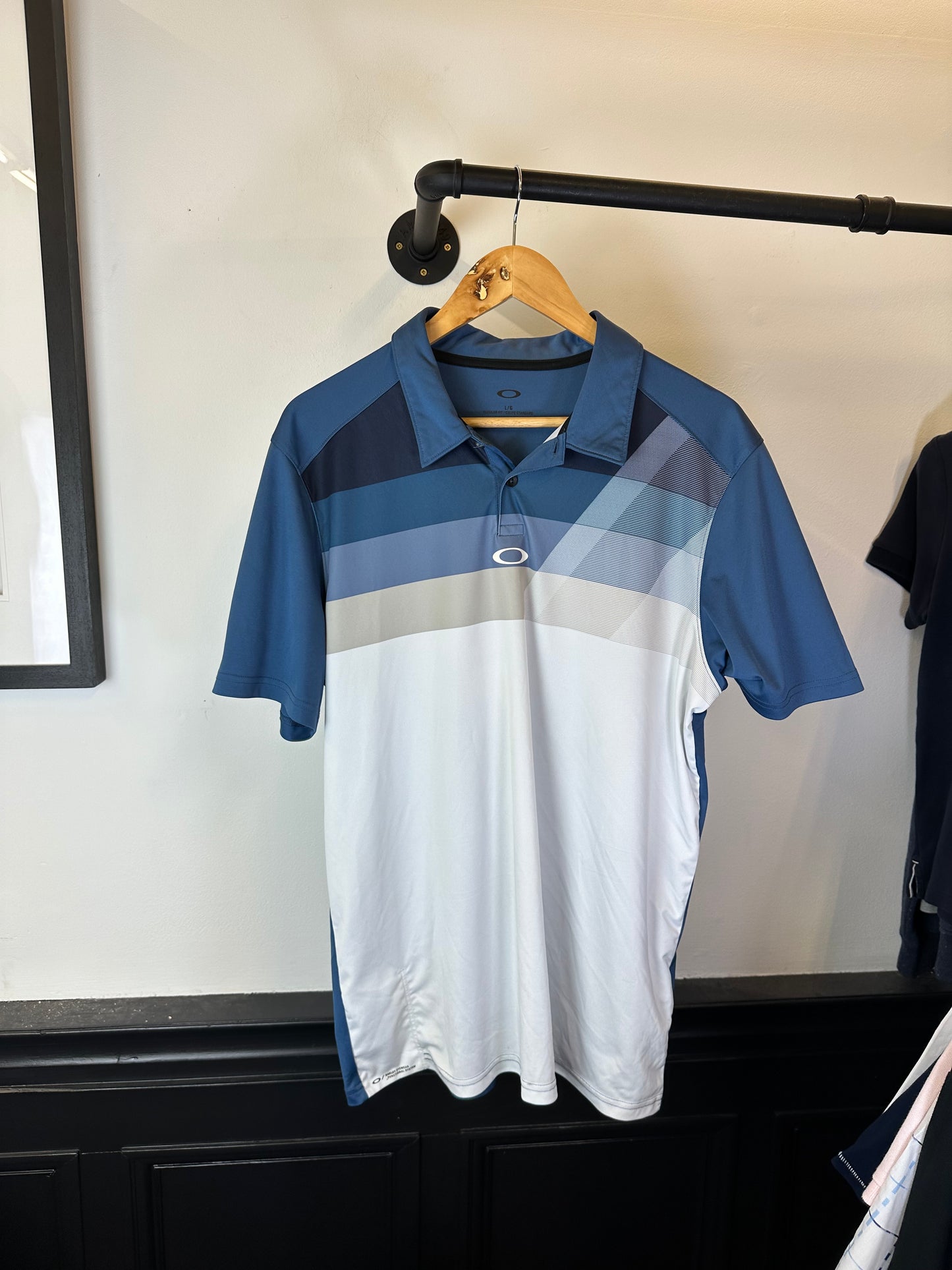 Oakley polo top (L)