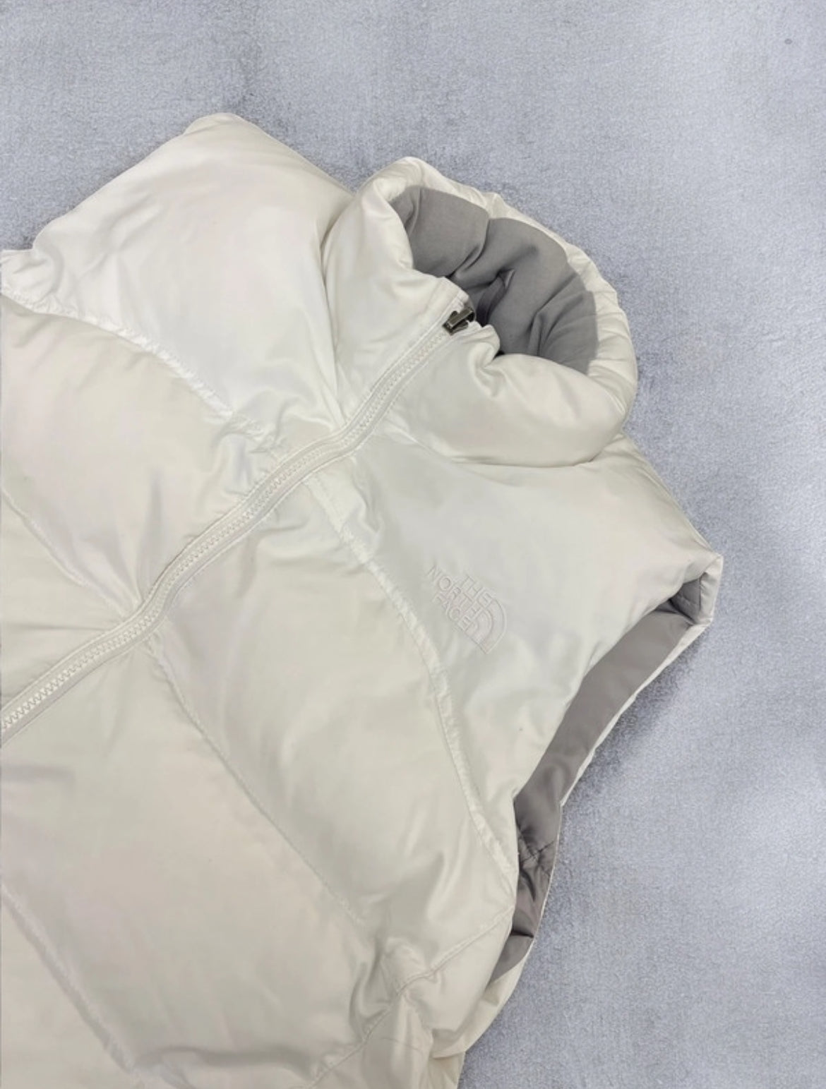 All white The North Face Gilet (L)