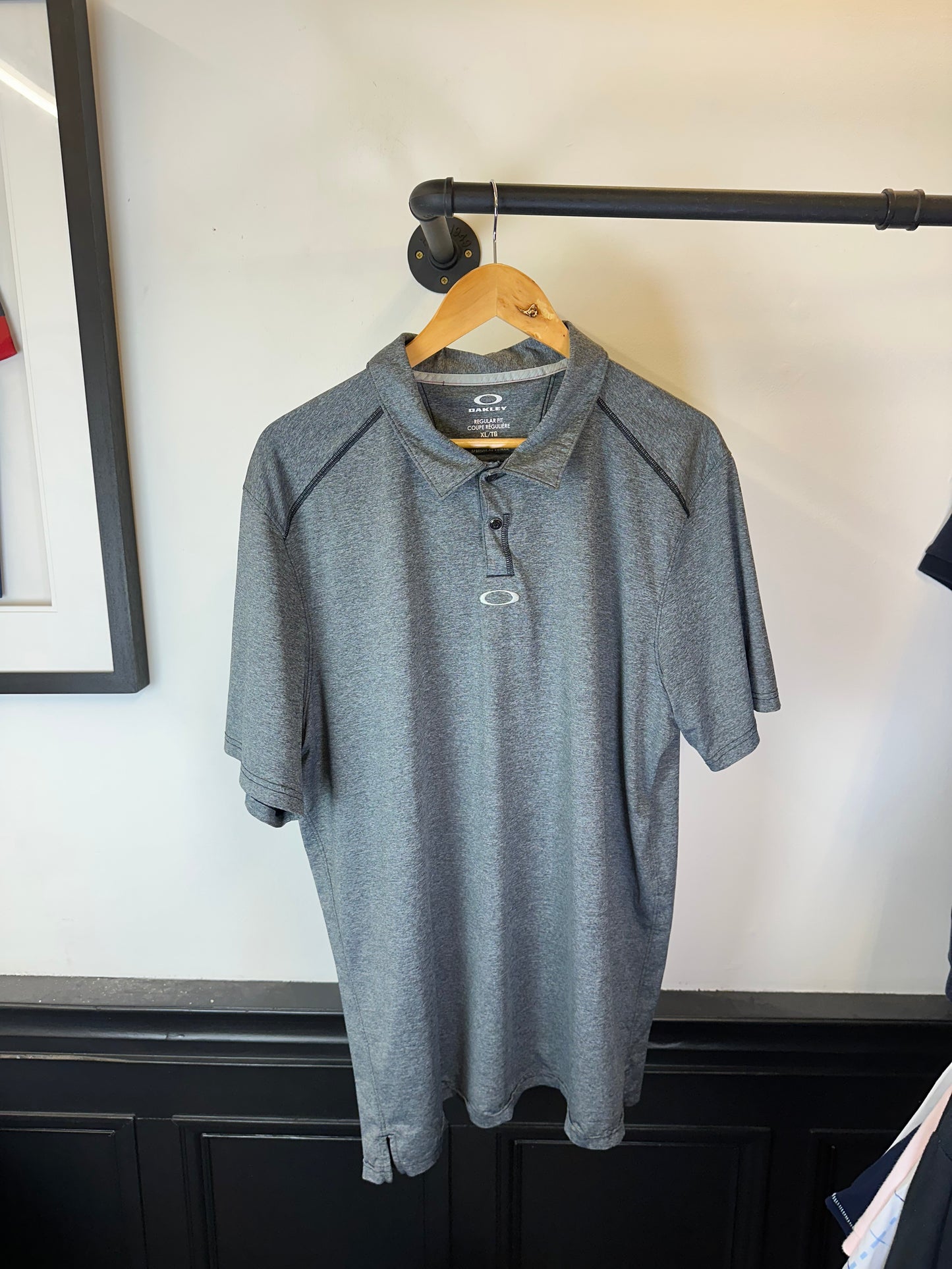 Oakley polo top (XL)
