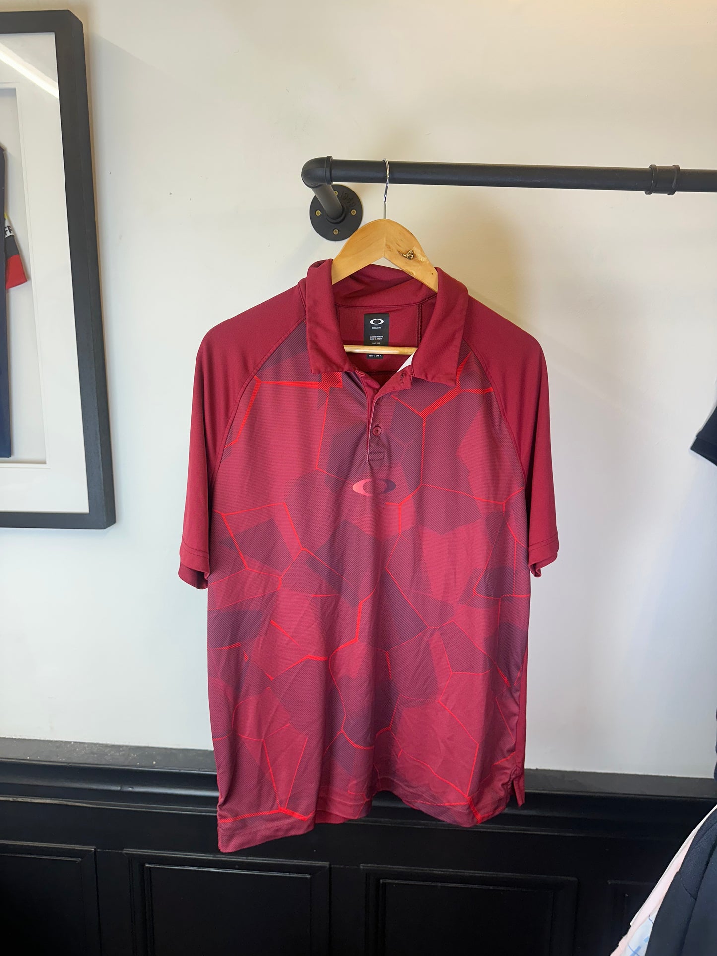 Oakley polo top (L)