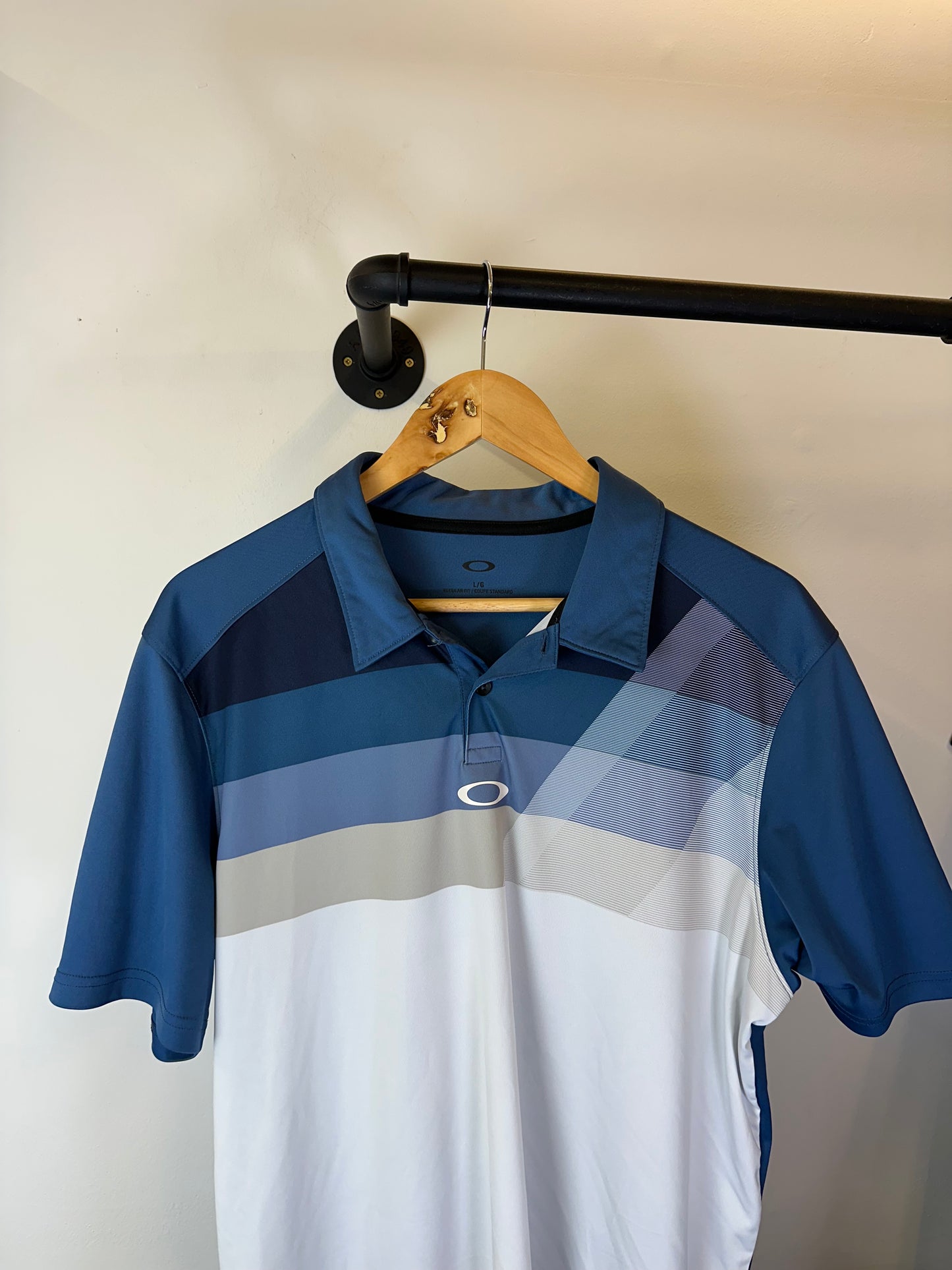 Oakley polo top (L)