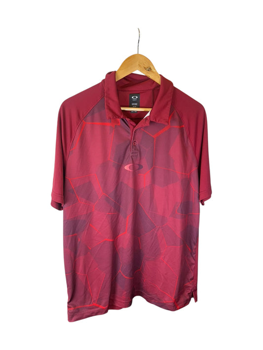 Oakley polo top (L)