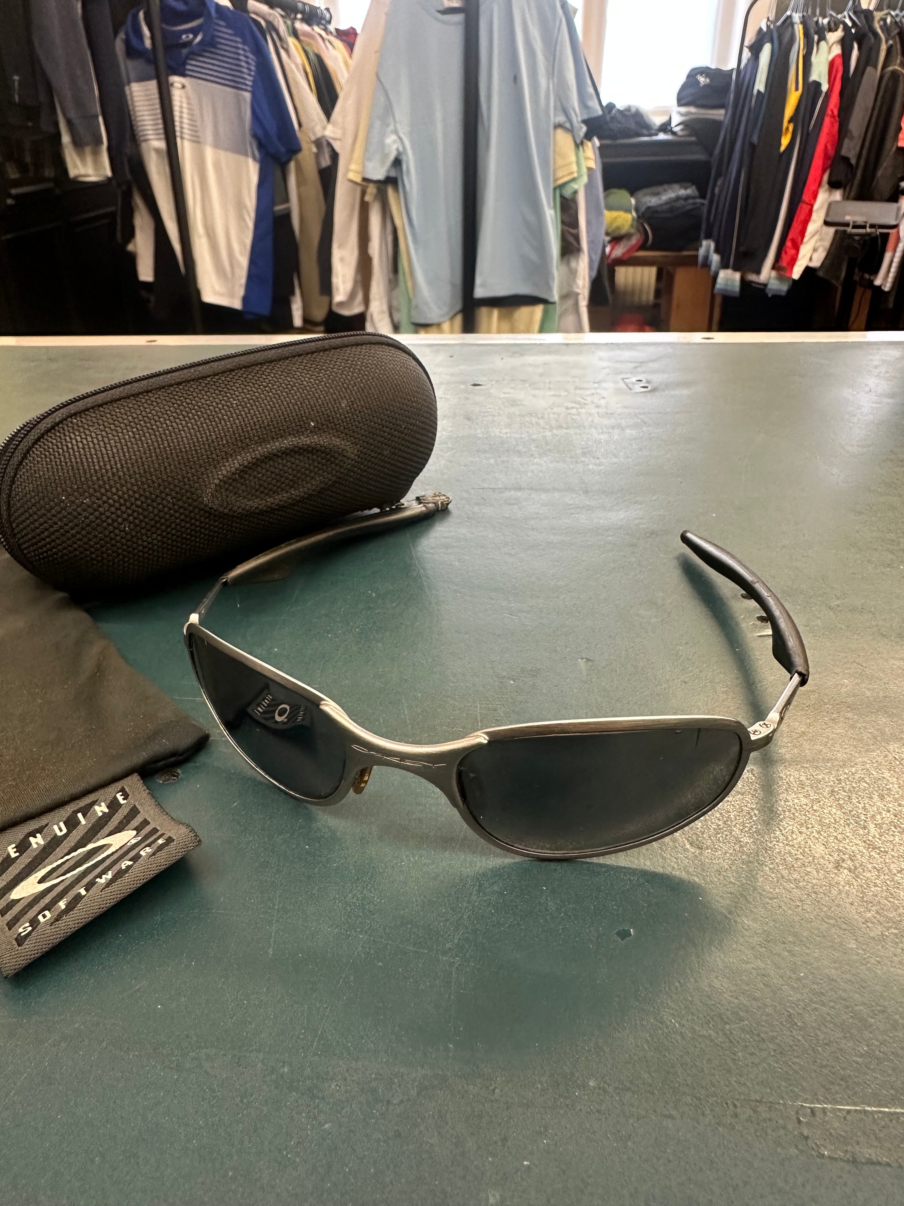 Oakley A Wire Brushed Silver Sunglasses – PALM STUDIOS VINTAGE Oakley A Wire Brushed Silver Sunglasses – PALM STUDIOS VINTAGE